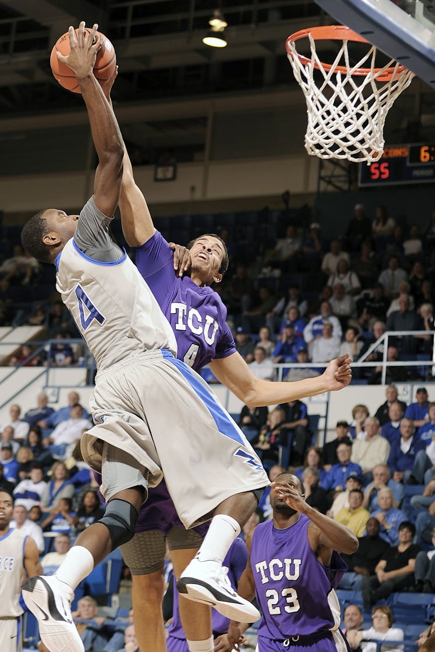 two men playing basketball